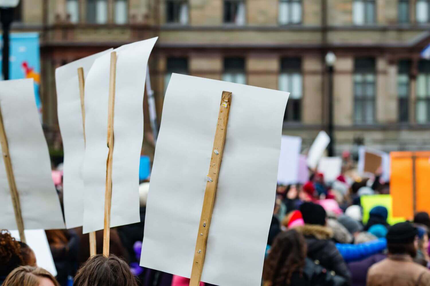 Photo of protest crowd in london, representing article on loan charge review scandal
